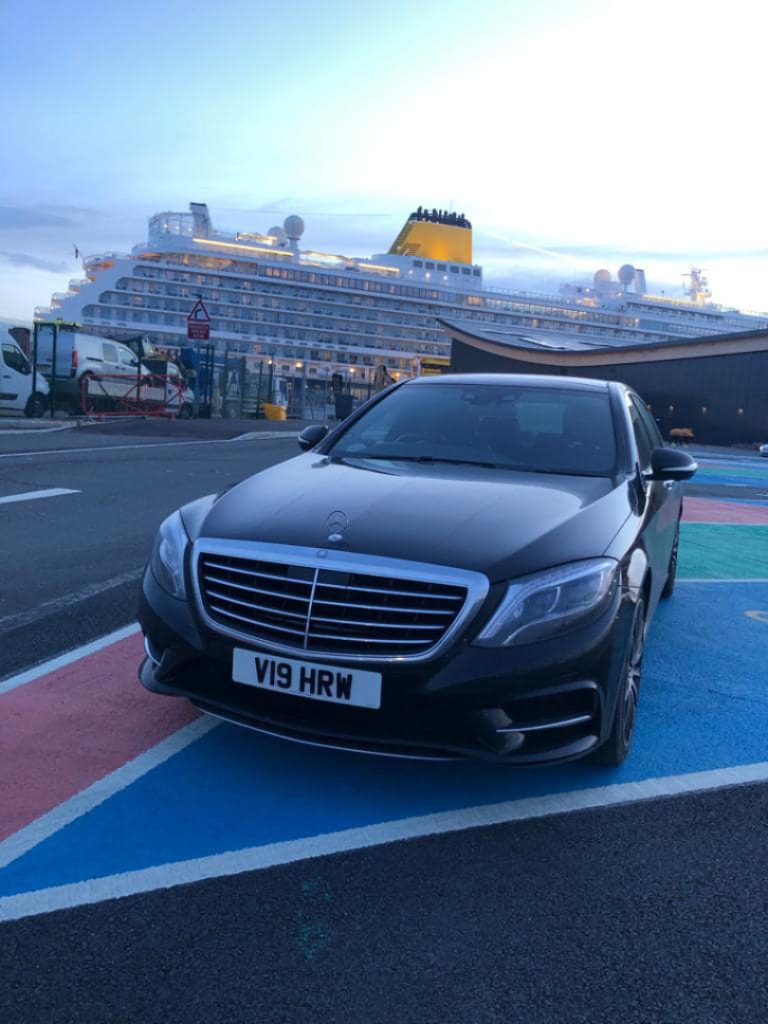 Mercedes S Class parked in front of cruise ship at Southampton seaport